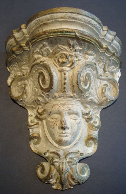 an ornate wall bracket